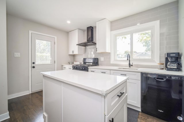 kitchen with dark hardwood / wood-style flooring, wall chimney range hood, sink, black appliances, and white cabinetry