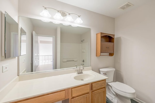 full bathroom featuring shower / bathing tub combination, vanity, and toilet