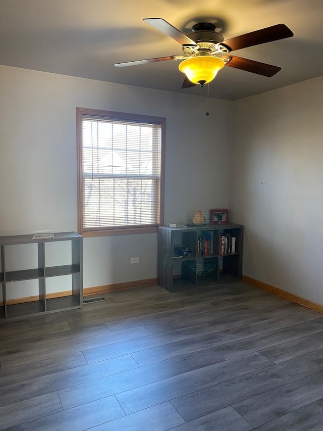 miscellaneous room with hardwood / wood-style floors and ceiling fan