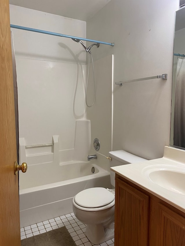 full bathroom featuring tile patterned flooring, vanity, toilet, and shower / bathing tub combination