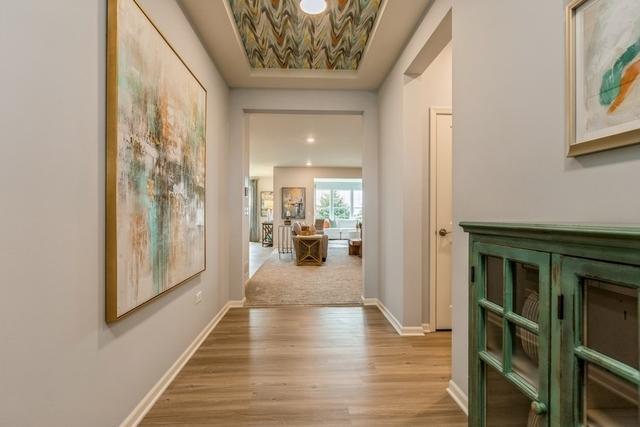 hall with light hardwood / wood-style flooring