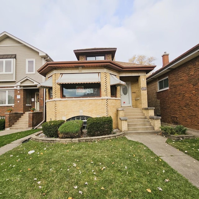 view of front of house with a front lawn