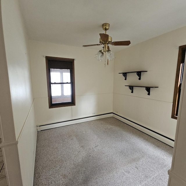 carpeted empty room with ceiling fan