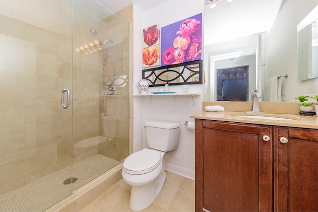 bathroom featuring an enclosed shower, vanity, toilet, and tile patterned floors