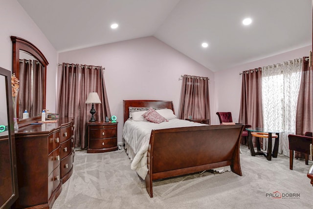 carpeted bedroom featuring vaulted ceiling