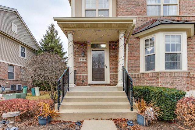 doorway to property with central AC