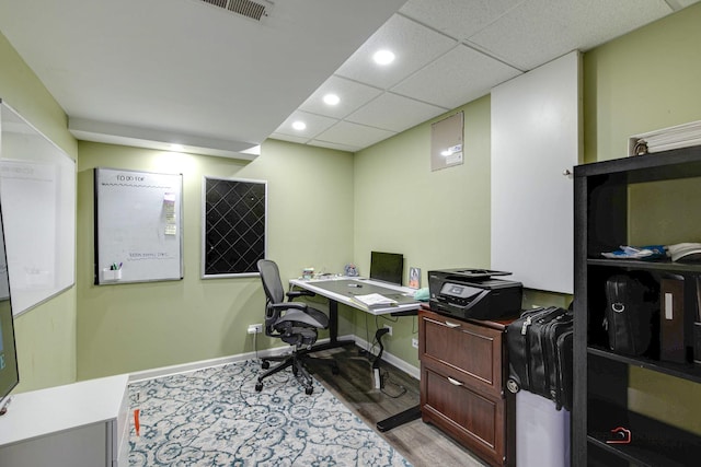 office space featuring a paneled ceiling