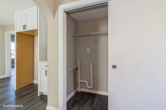 washroom featuring dark hardwood / wood-style floors