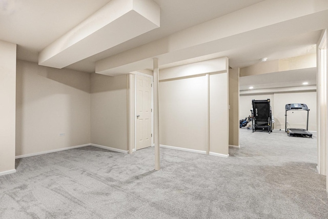 finished below grade area featuring recessed lighting, carpet flooring, and baseboards