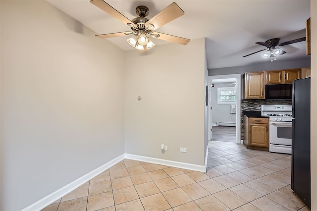 kitchen with backsplash, black appliances, ceiling fan, light tile patterned floors, and baseboard heating