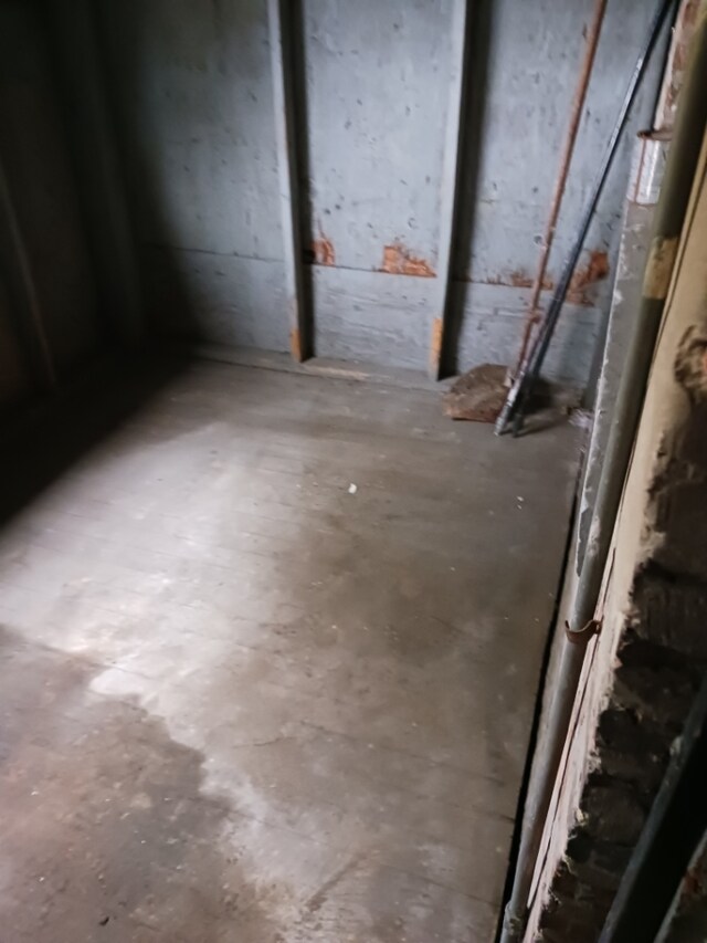 empty room featuring wood-type flooring