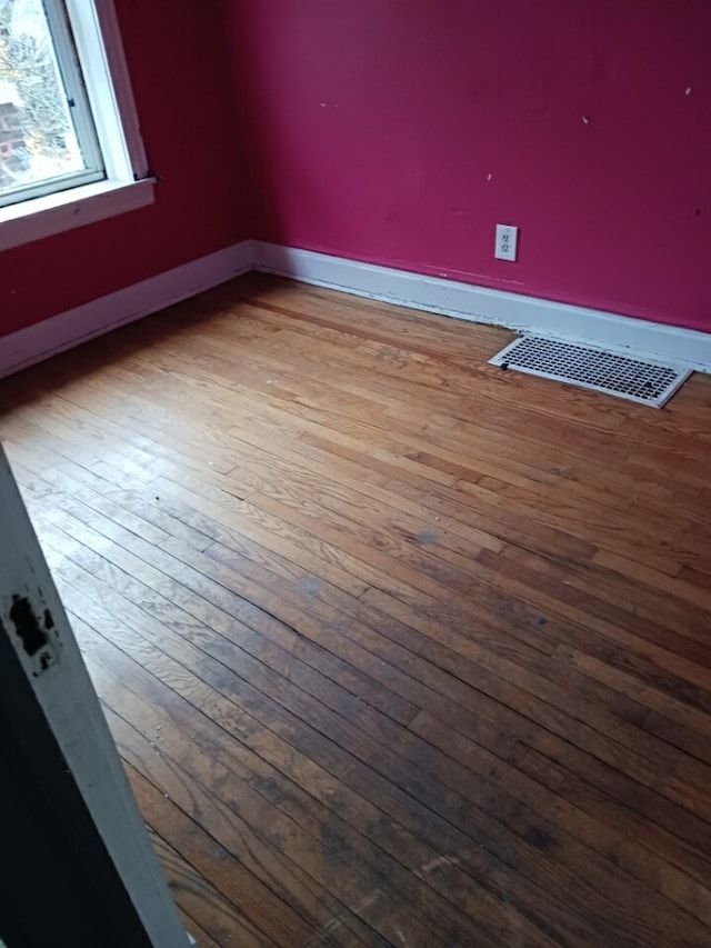 interior space with hardwood / wood-style flooring