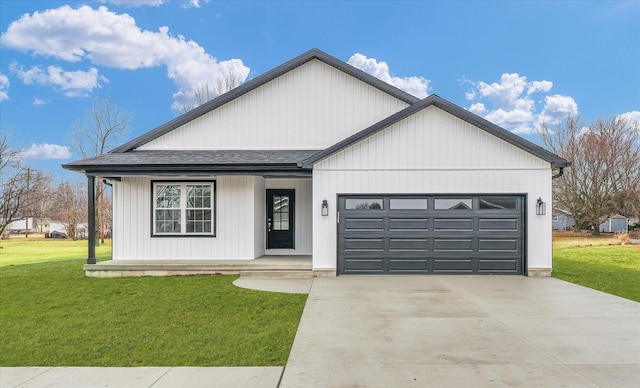 modern farmhouse style home with a garage, a front lawn, and covered porch