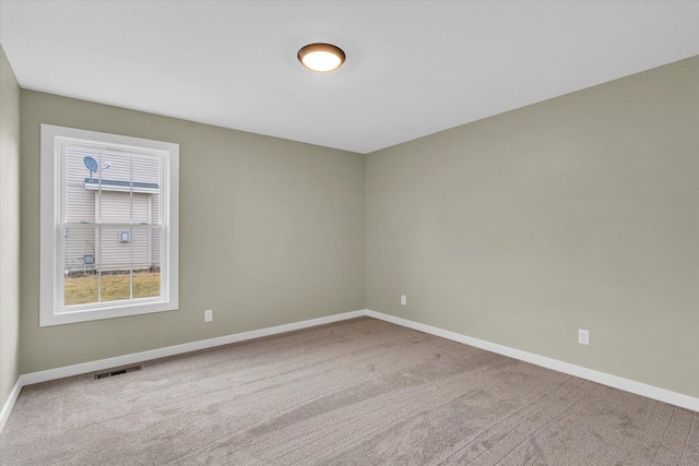 view of carpeted spare room