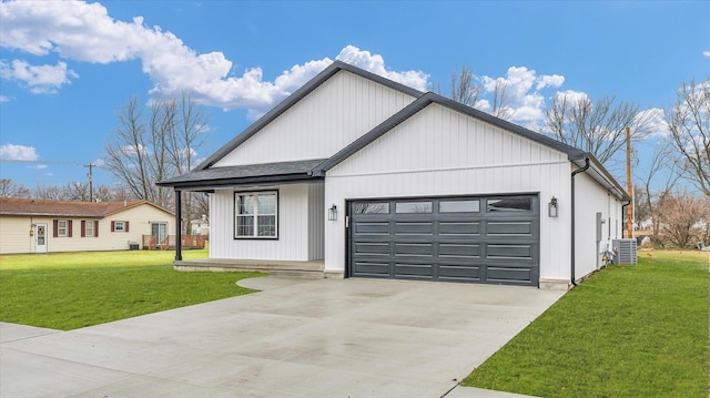 modern farmhouse style home with a garage and a front yard