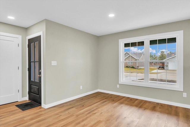 entryway with light hardwood / wood-style flooring