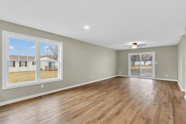 interior space featuring ceiling fan and light hardwood / wood-style flooring