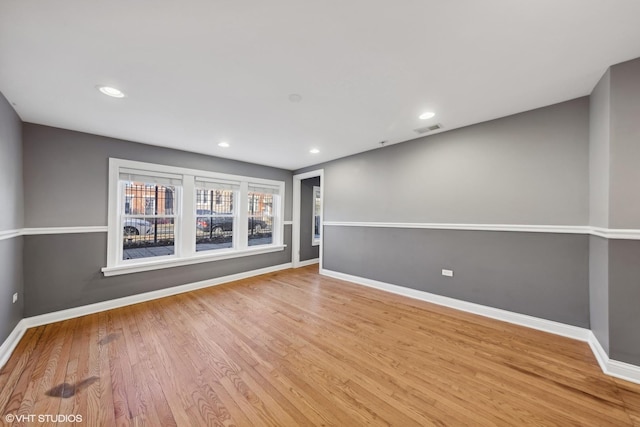 unfurnished room featuring light hardwood / wood-style flooring