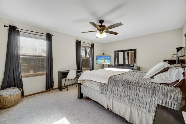 bedroom with ceiling fan and carpet