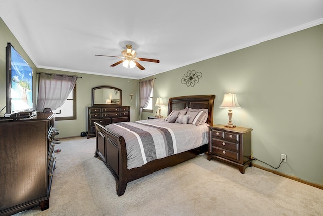 bedroom featuring multiple windows, crown molding, light colored carpet, and ceiling fan