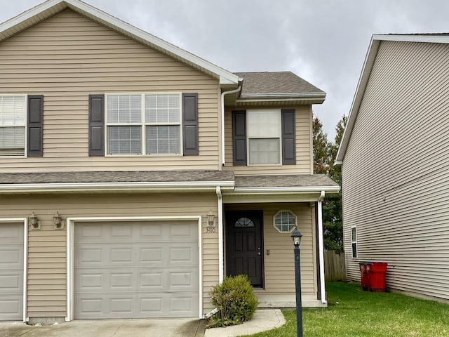 view of front of property featuring a garage