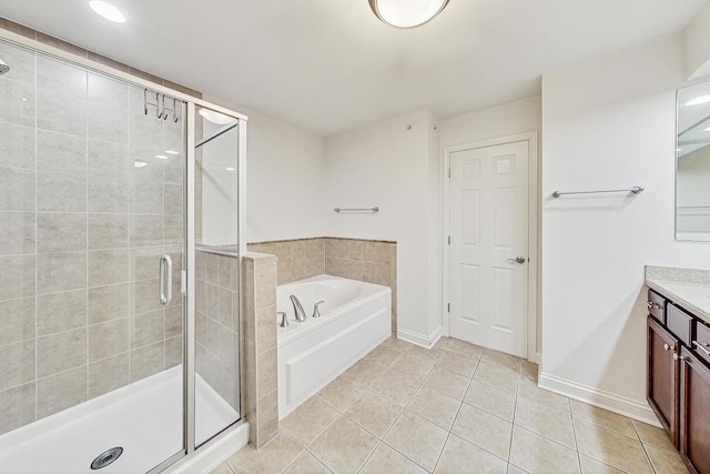 bathroom with separate shower and tub, tile patterned flooring, and vanity