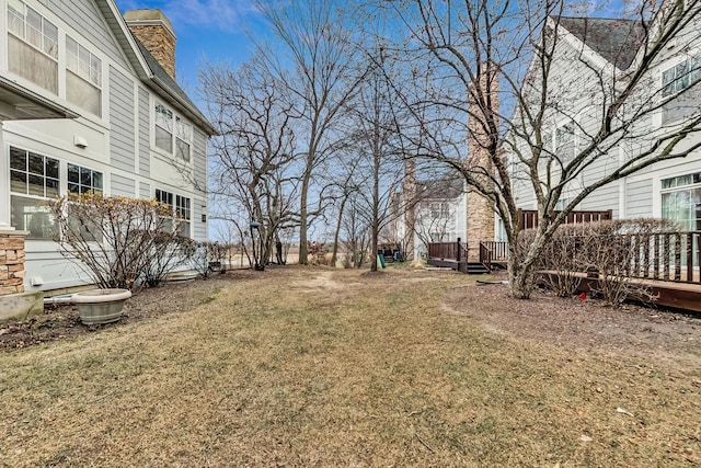 view of yard featuring a deck