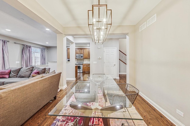 dining room featuring hardwood / wood-style flooring