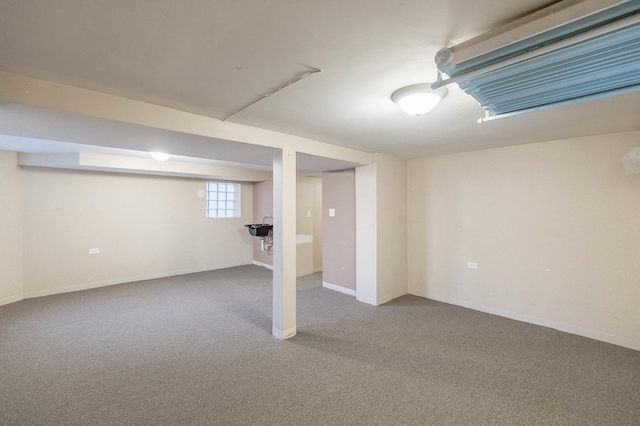 basement featuring carpet flooring