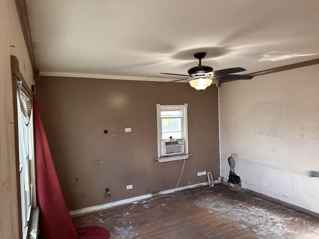 spare room featuring ceiling fan, crown molding, cooling unit, and dark hardwood / wood-style floors