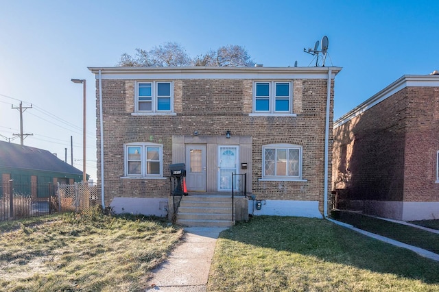 view of front of property featuring a front yard