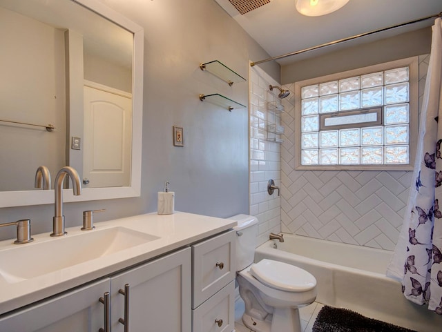 full bathroom with tile patterned flooring, vanity, toilet, and shower / tub combo with curtain