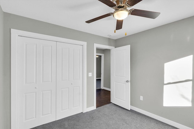 unfurnished bedroom featuring carpet flooring, a closet, and ceiling fan