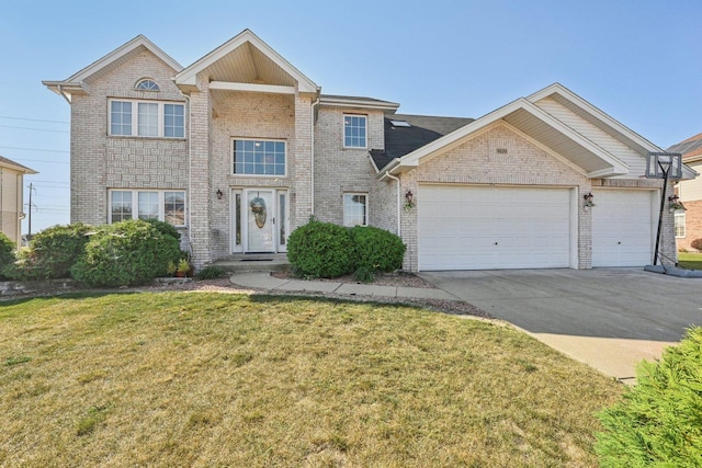 view of front facade with a front yard and a garage