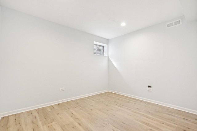 empty room with light wood-type flooring