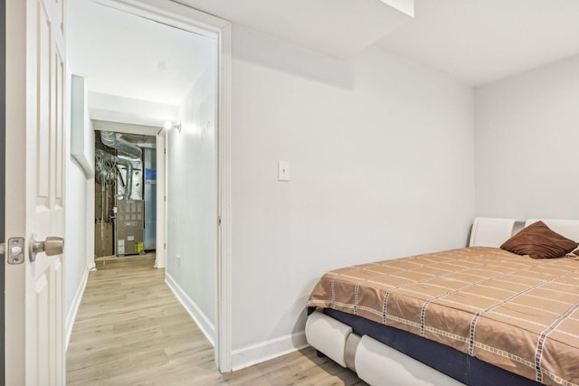 bedroom with light hardwood / wood-style flooring