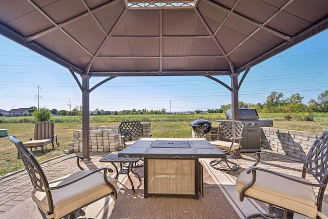 view of patio / terrace featuring a gazebo and area for grilling