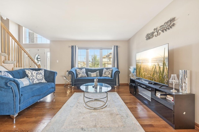 living room with dark hardwood / wood-style flooring