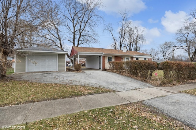 single story home featuring a garage and a carport