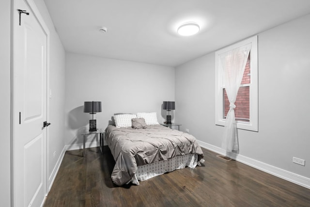 bedroom featuring hardwood / wood-style flooring