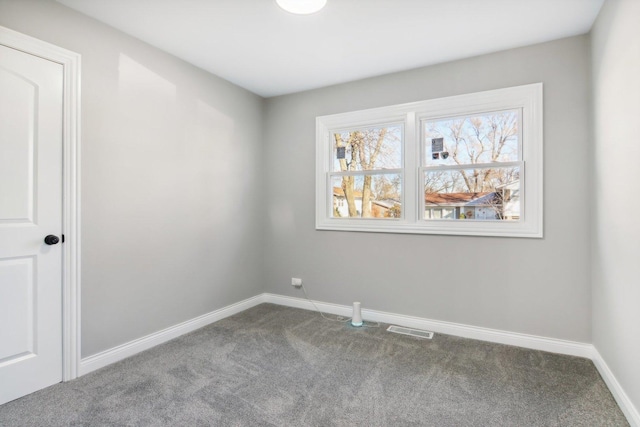 view of carpeted spare room