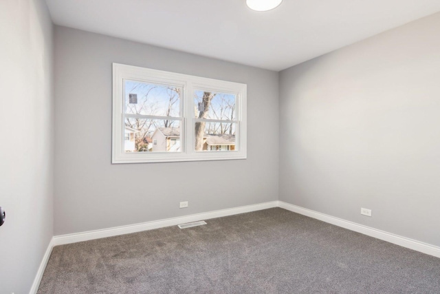 view of carpeted spare room