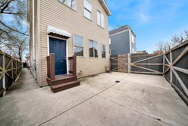 back of house with a patio