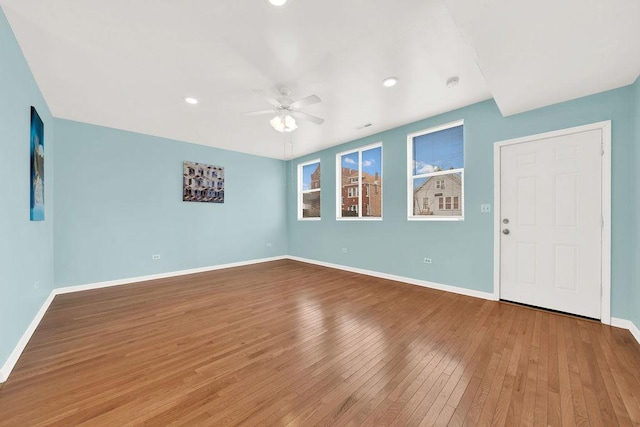 interior space featuring ceiling fan and hardwood / wood-style floors