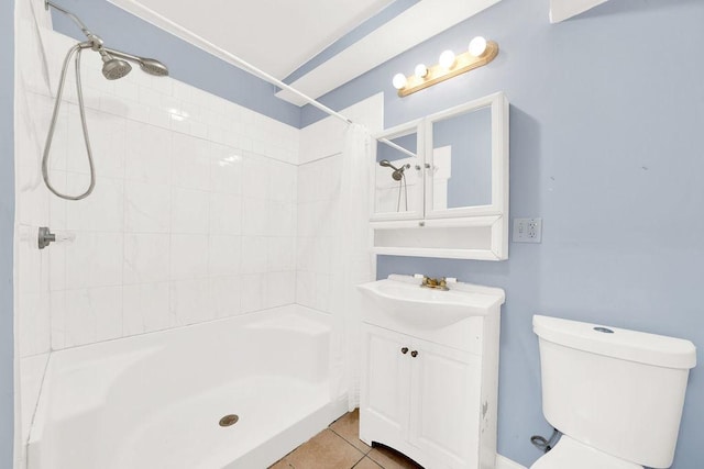 bathroom with curtained shower, tile patterned flooring, vanity, and toilet