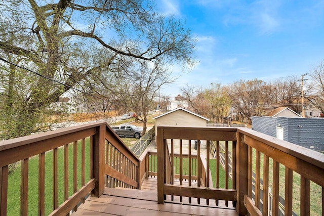 wooden deck with a yard