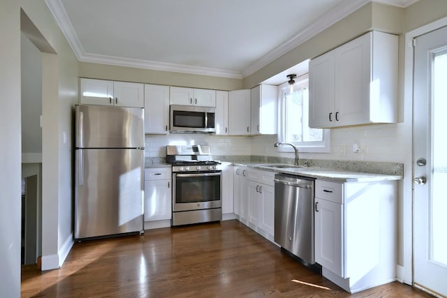 kitchen featuring white cabinets, dark hardwood / wood-style floors, sink, and stainless steel appliances