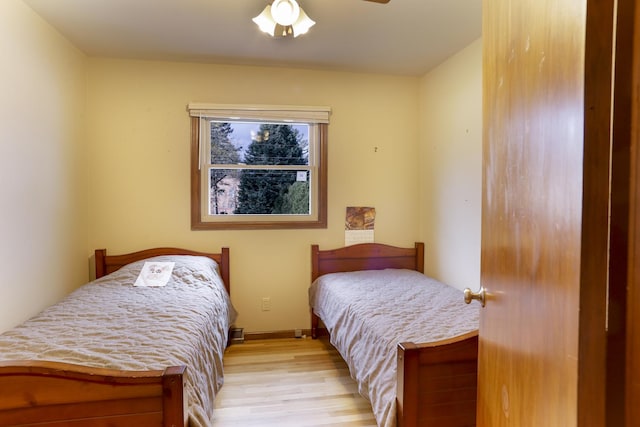 bedroom featuring ceiling fan and light wood-type flooring