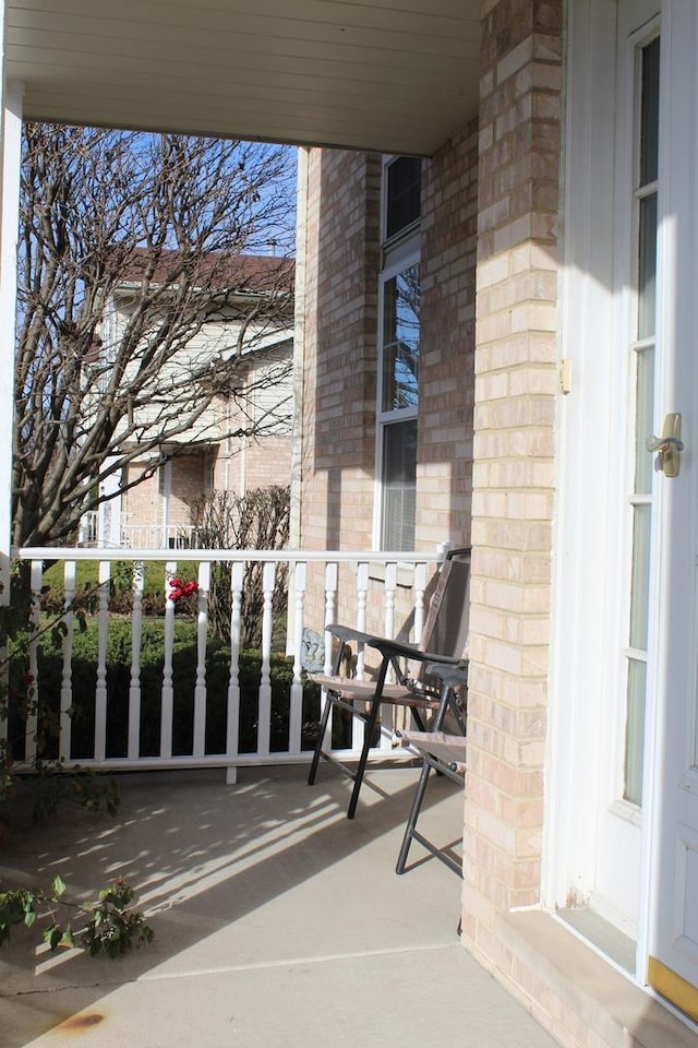 balcony featuring a porch