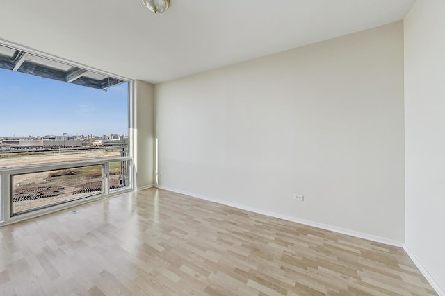 empty room featuring light hardwood / wood-style floors